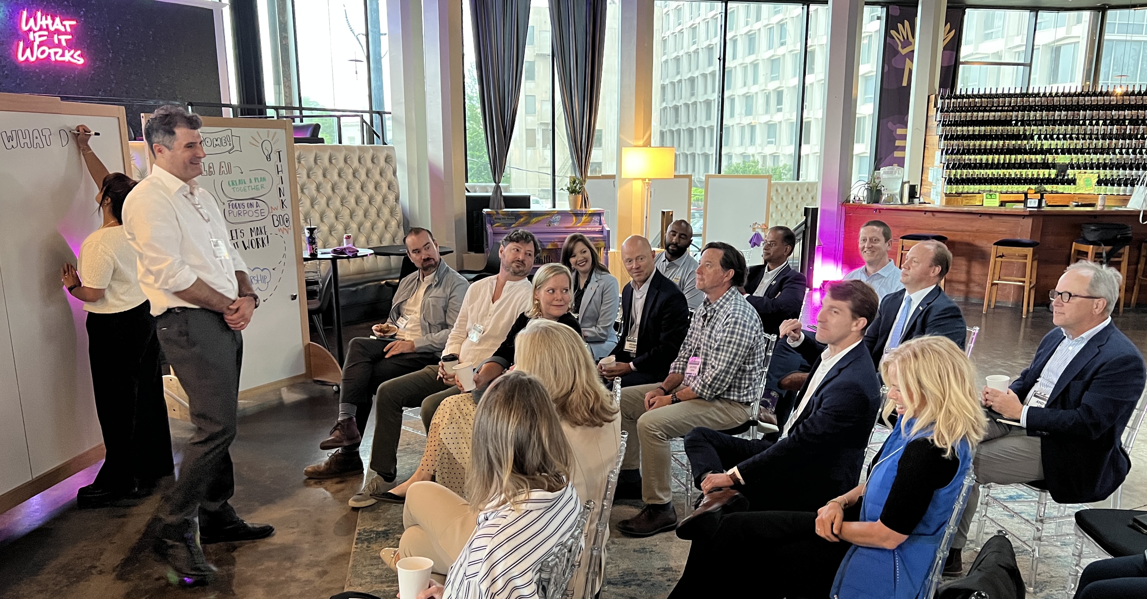 Facilitator leading a room of professionals